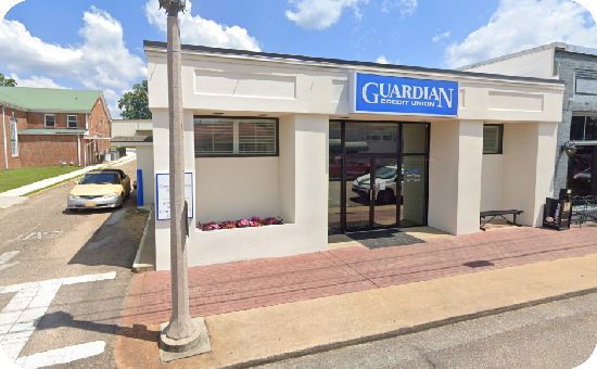 Exterior view of Guardian Credit Union’s Maplesville branch building, with visible parking lot.