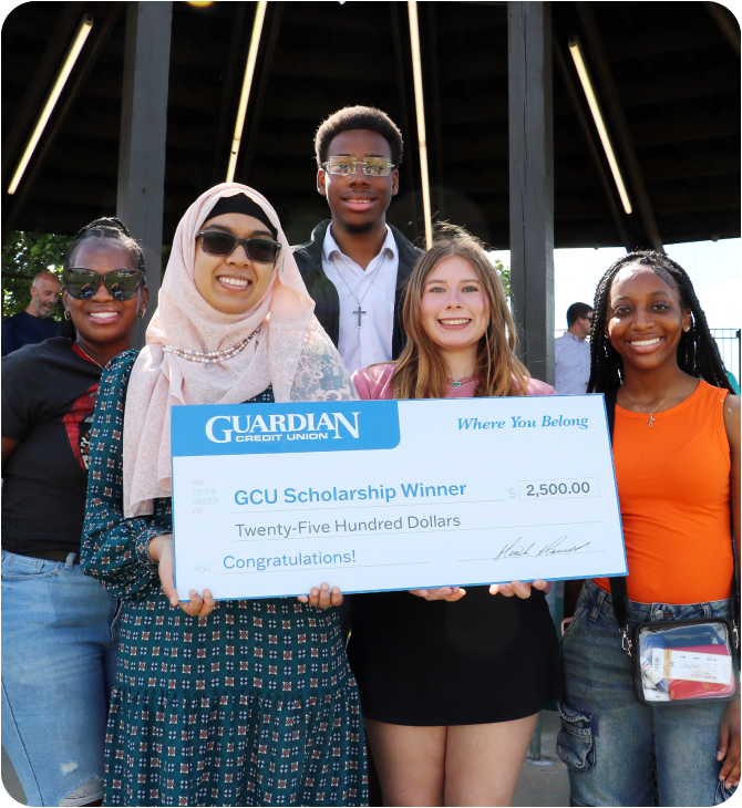Photo of five of the Guardian Credit Union 2025 Scholarship Recipients holding the $2,500 check! 
