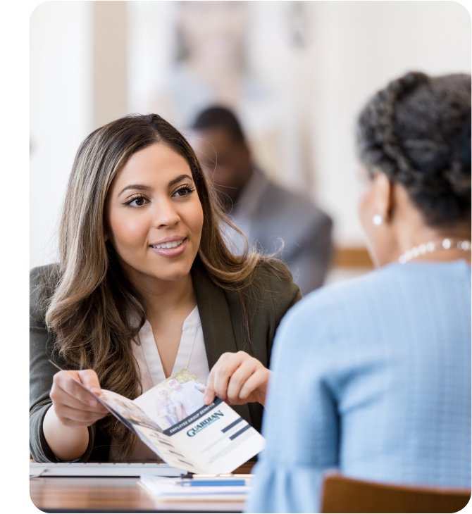 Guardian Credit Union Insurance Agent explains employee benefits, highlighting coverage and support options