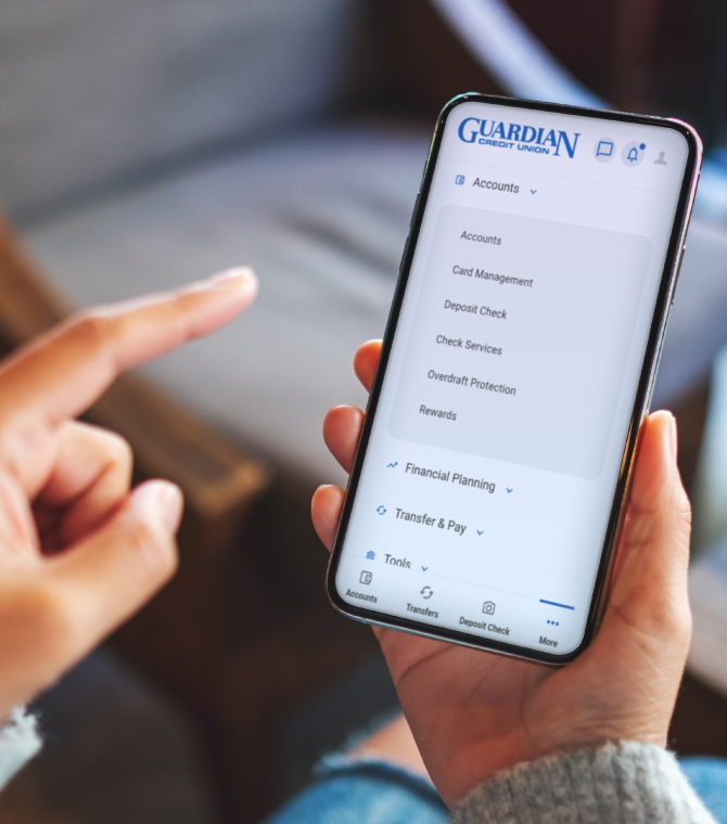 Person using Guardian Credit Union mobile app for secure online banking and financial account management