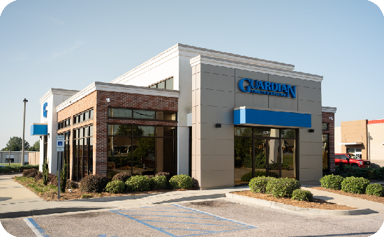 Exterior view of Guardian Credit Union’s Prattville at East Main Street branch building, with visible parking lot and landscaped surroundings