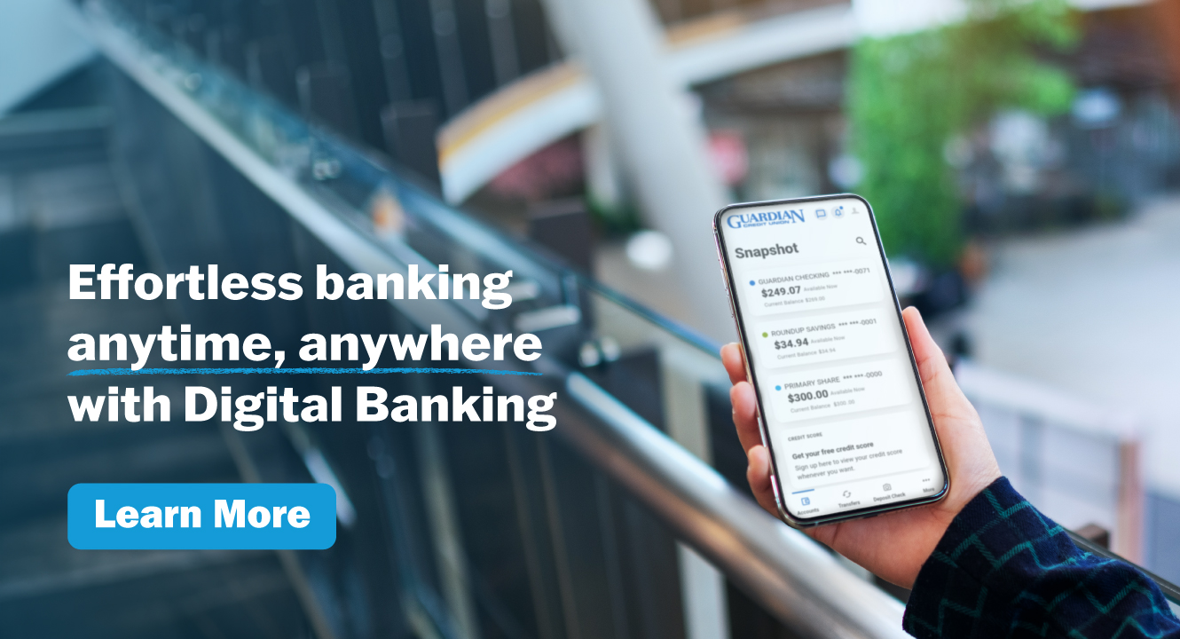 Woman's hand holding cell phone with Guardian Credit Union mobile banking app open