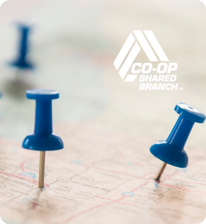 Close-up of a U.S. map with blue pushpins marking locations, with the CO-OP Shared Branch logo in the corner, symbolizing nationwide access to credit union services through shared branching.
