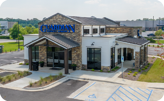Exterior view of Guardian Credit Union’s Wetumpka branch building, with visible parking lot and landscaped surroundings